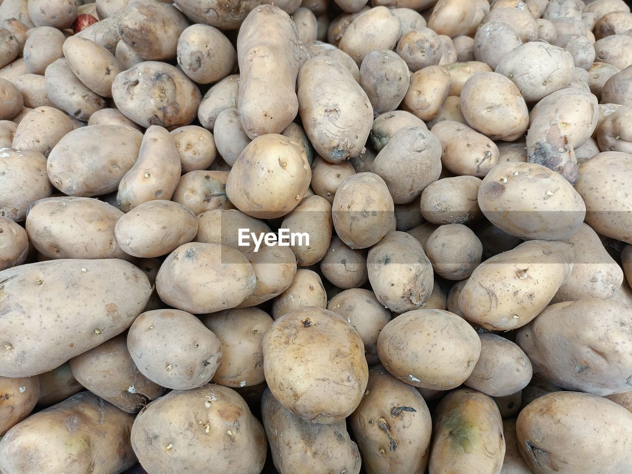 Full frame shot of potatoes for sale at market stall