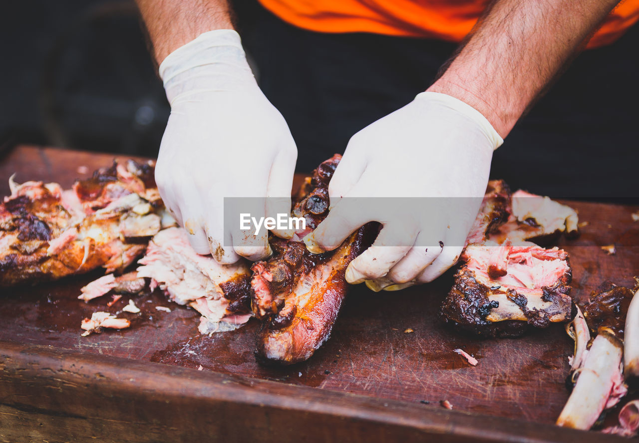 Close-up of man preparing food