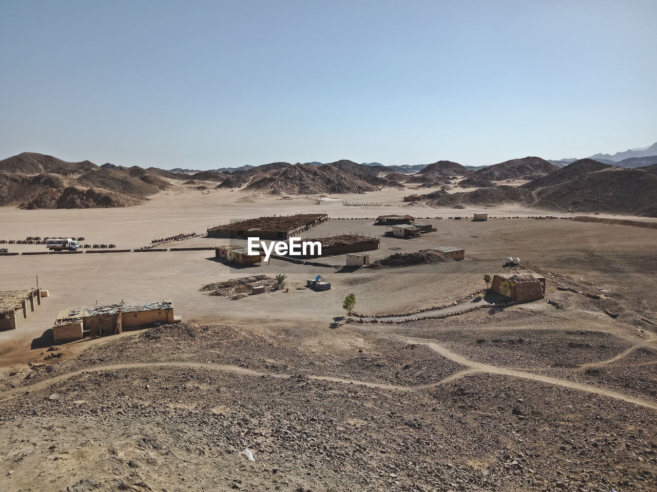 A group of people on quad bikes in the desert of egypt