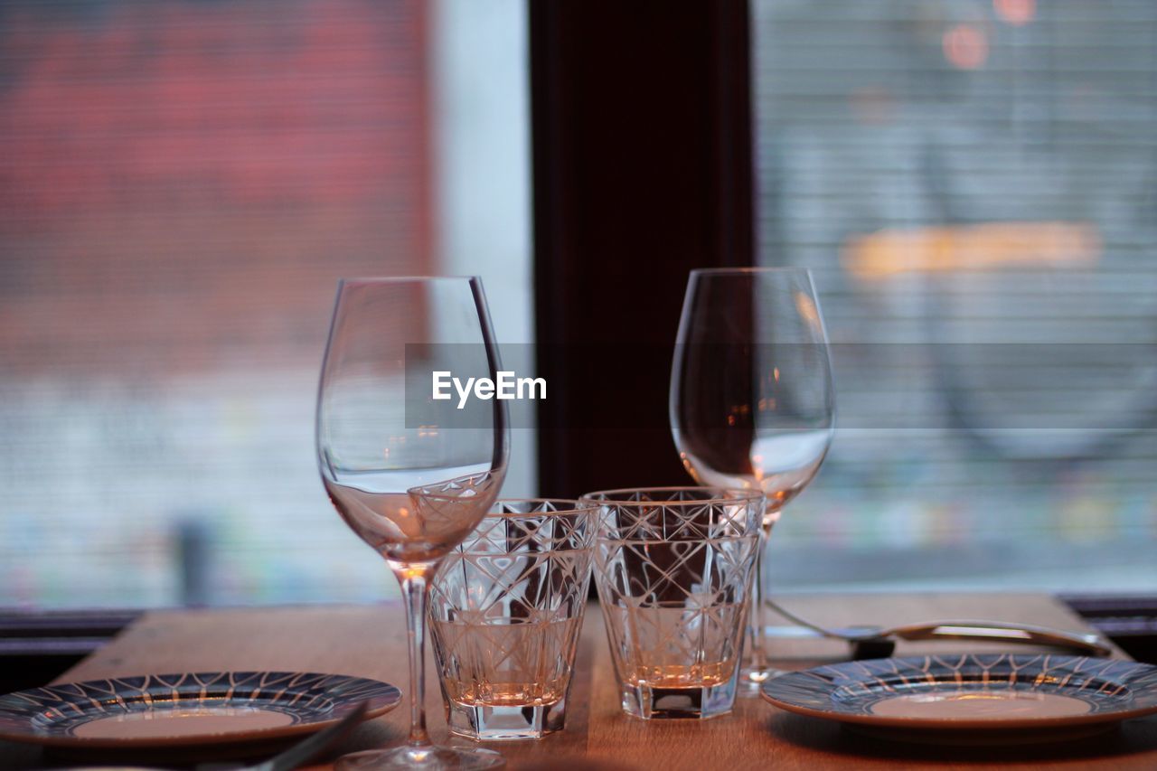 Close-up of wine in glass on table