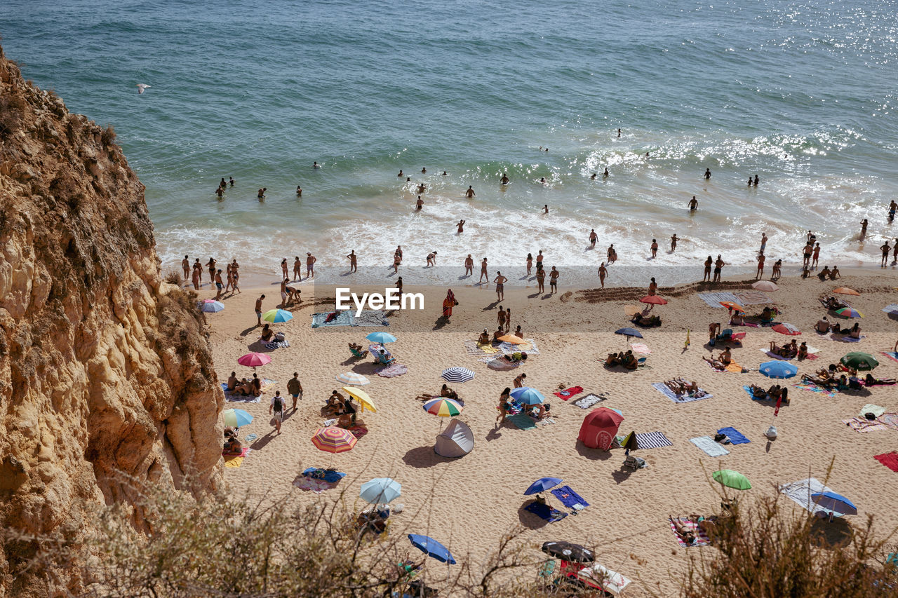 High angle view of people at beach in portugal.