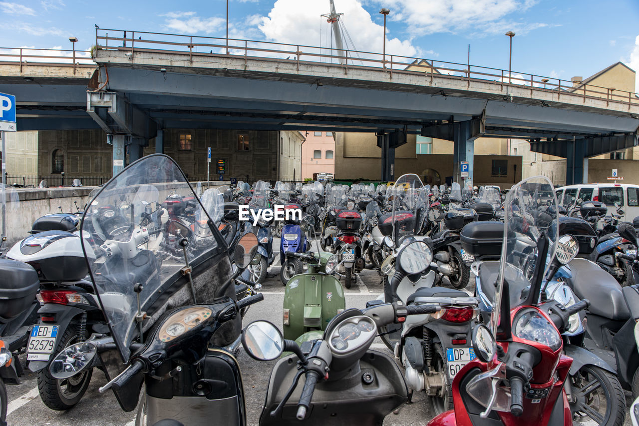 BICYCLES PARKED ON STREET IN CITY