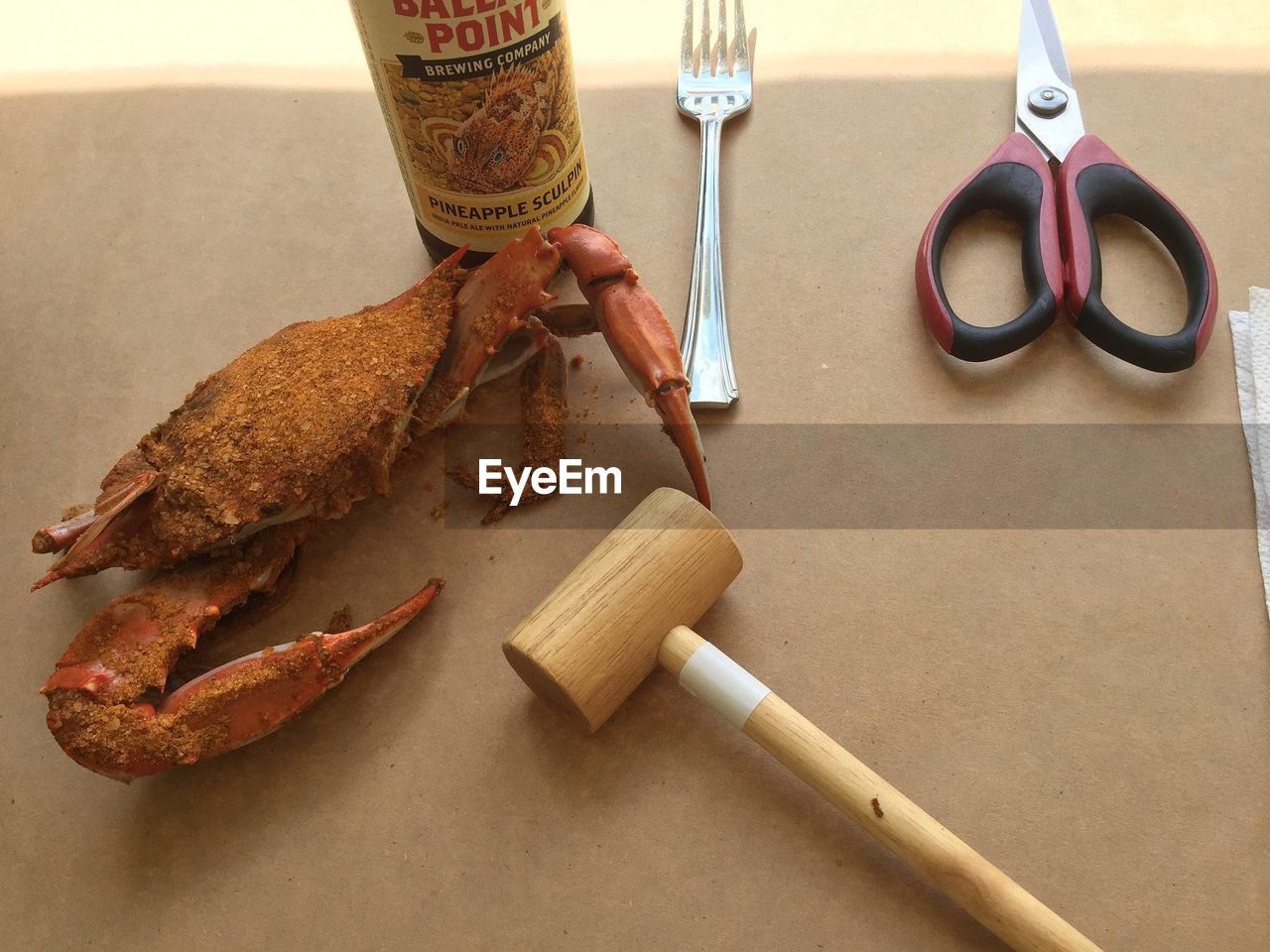 CLOSE-UP HIGH ANGLE VIEW OF HAND PREPARING FOOD