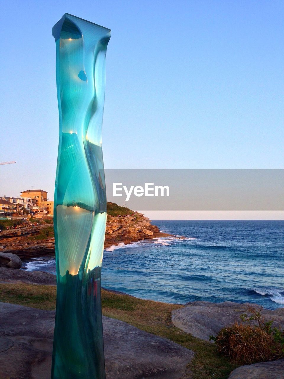 VIEW OF SEA AGAINST BLUE SKY