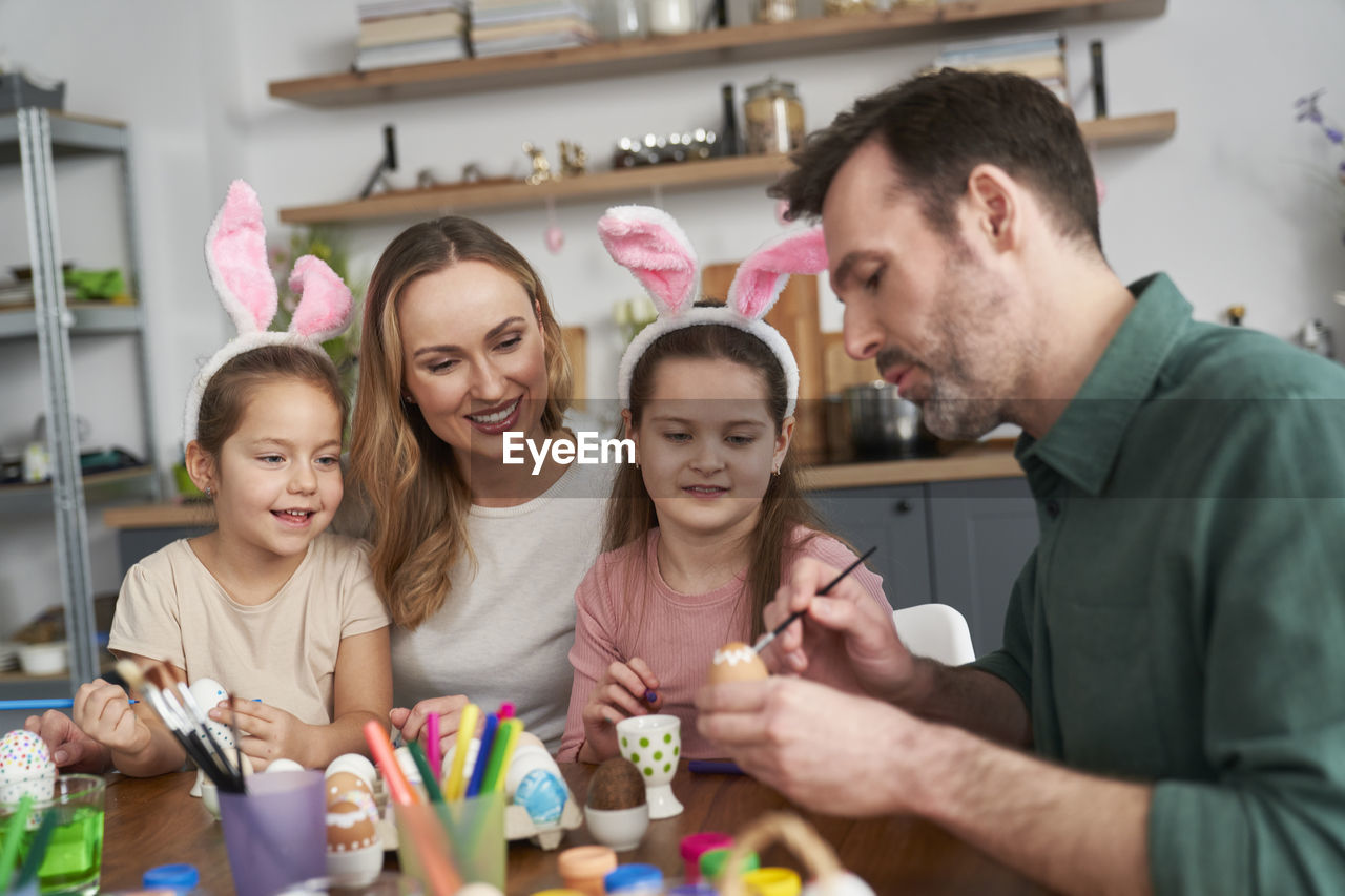 Portrait of smiling family at home