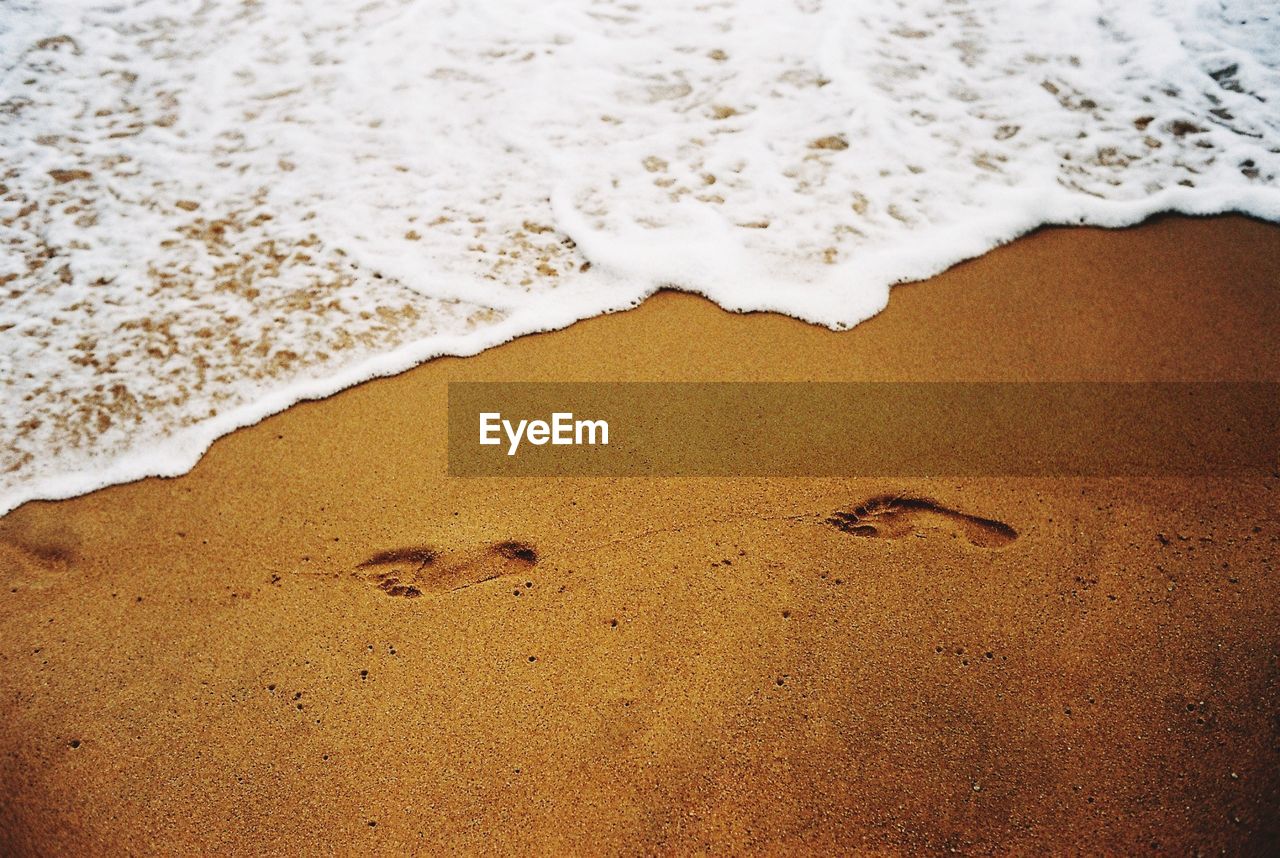 High angle view of sand on beach