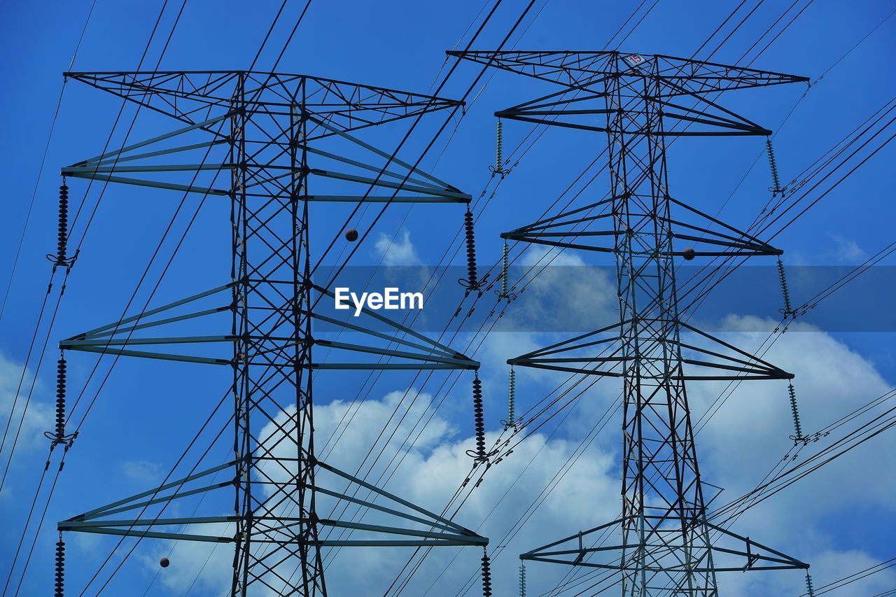 Electricity tower with beautiful clouds and blue sky