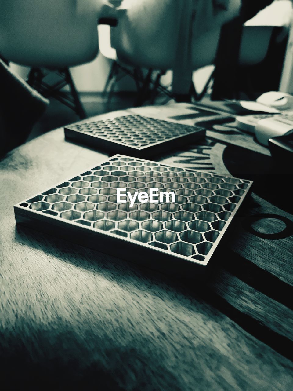 CLOSE-UP OF LAPTOP KEYBOARD ON TABLE