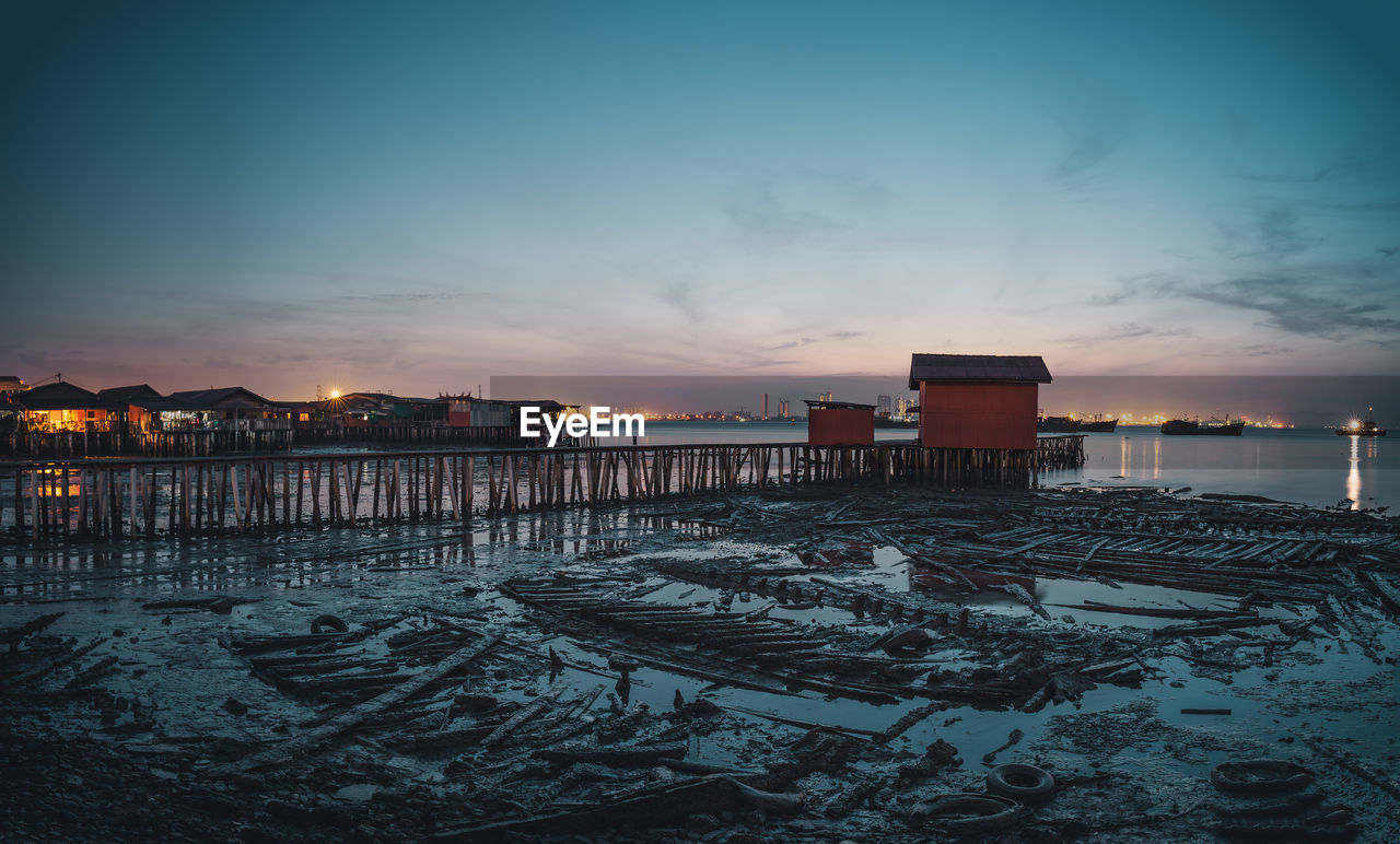 Scenic view of sea against sky at sunset