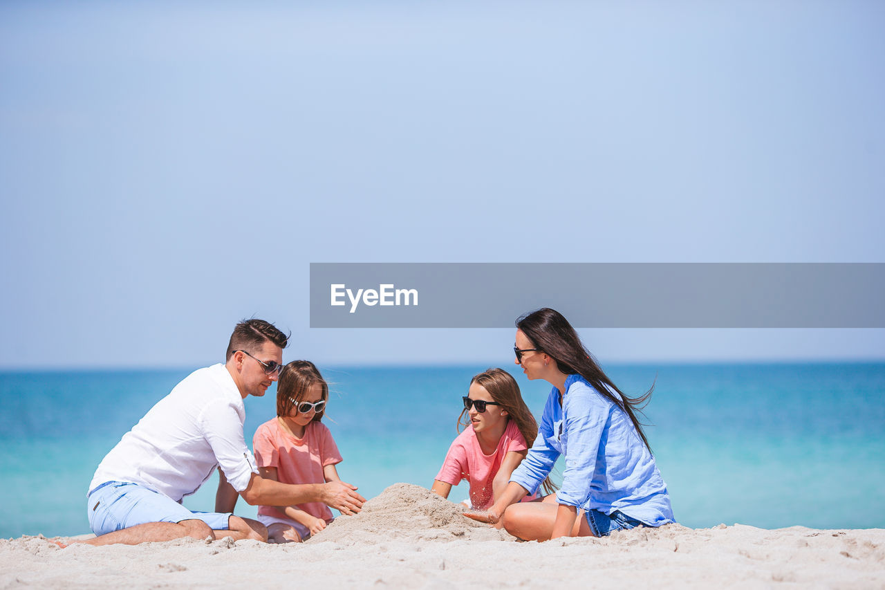 PEOPLE ON BEACH