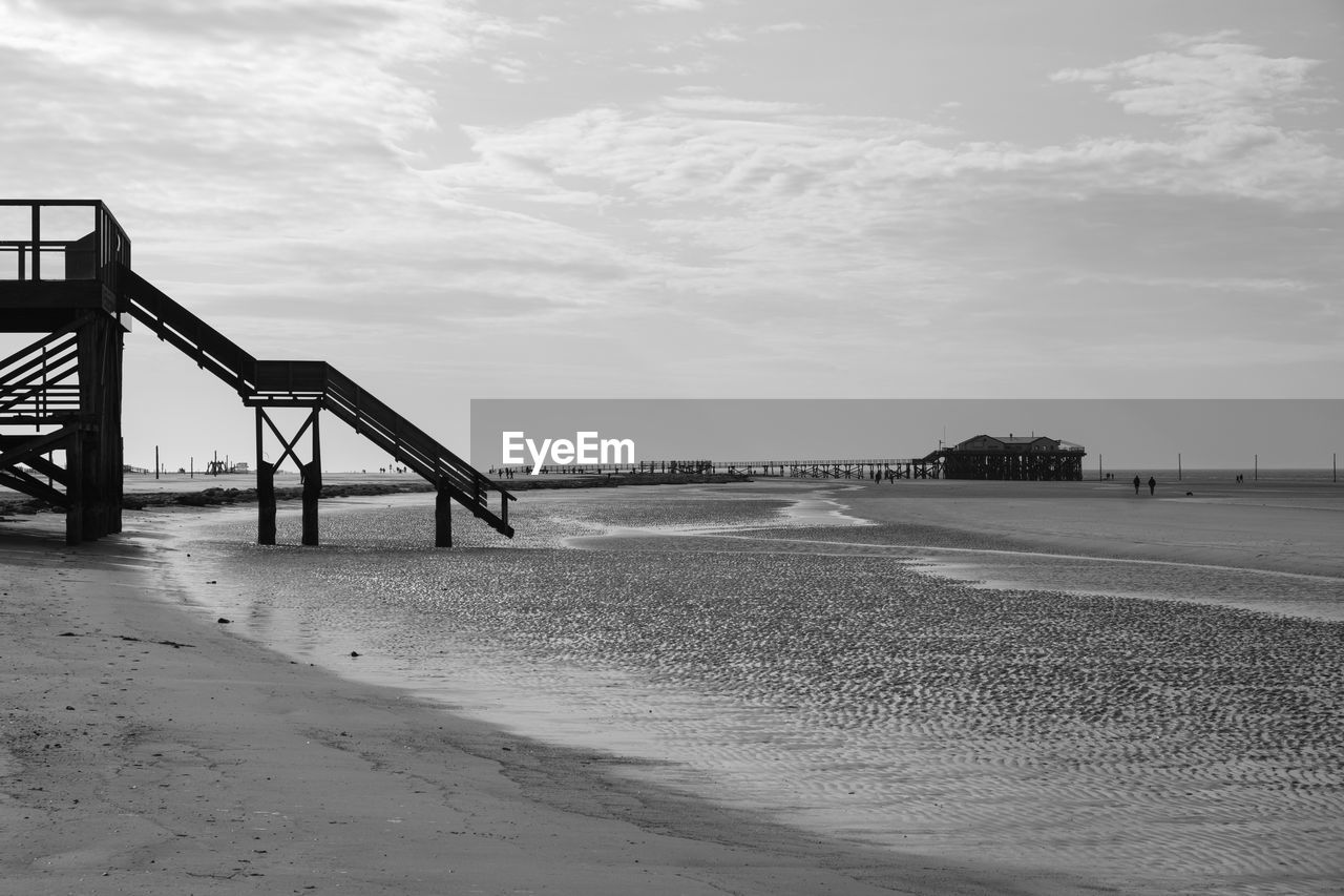 View of bridge over sea against sky