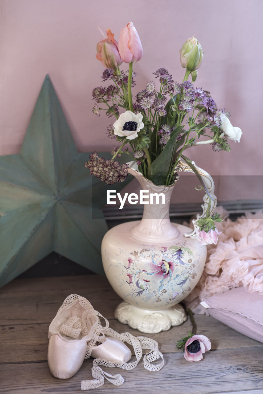 Flowers in old jug