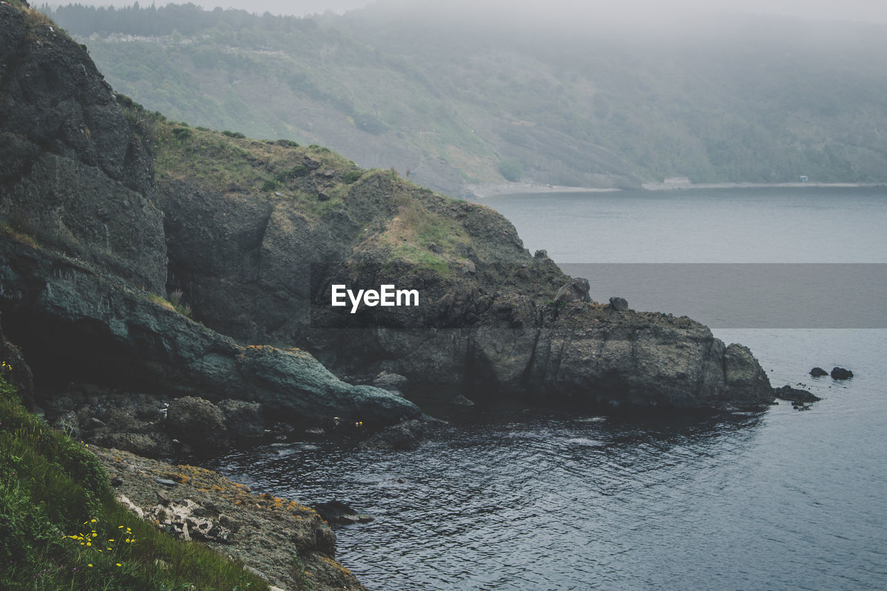 Scenic view of sea and mountains