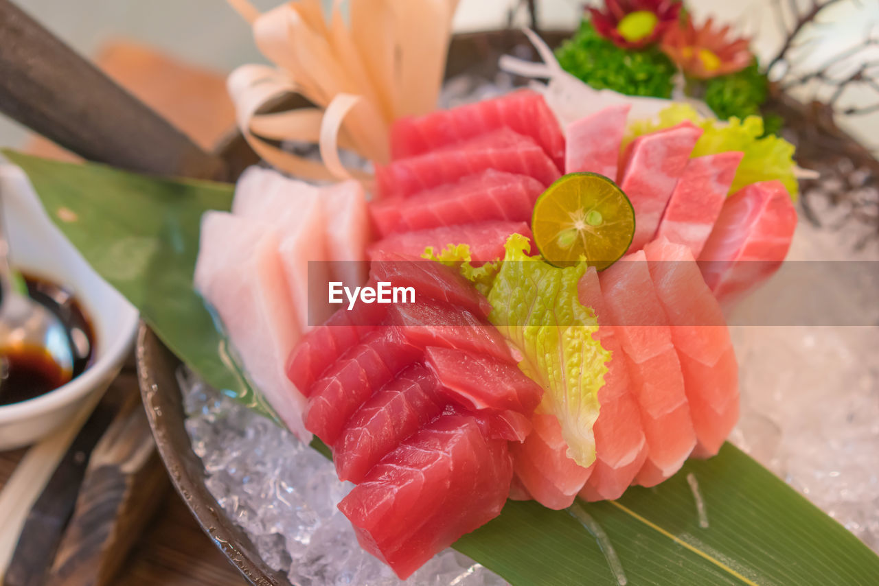 Salmon raw sashimi sushi on plate, japanese food.