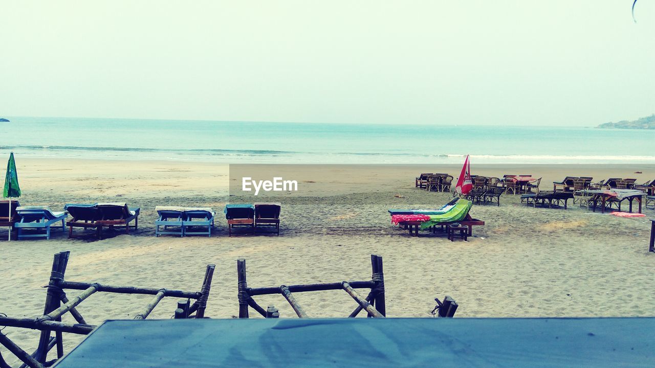 Scenic view of beach against clear sky