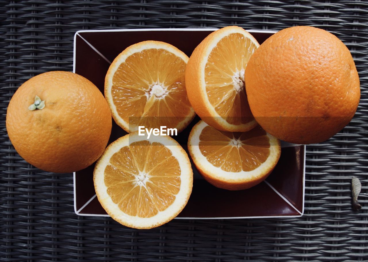 CLOSE-UP OF ORANGES ON ORANGE