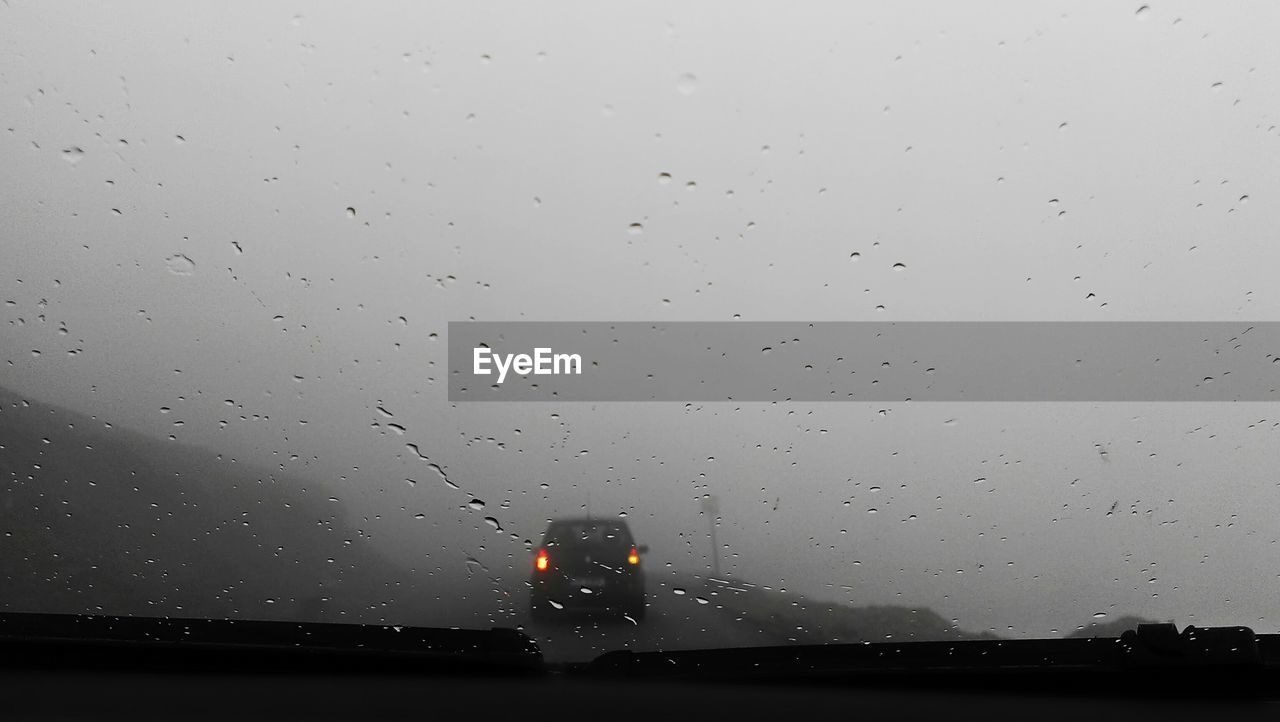 RAIN DROPS ON ROAD