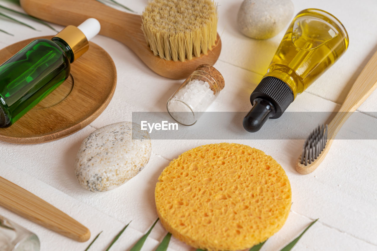 Natural spa cosmetic products, composition with bottles of essential oils, sea salt, sponges