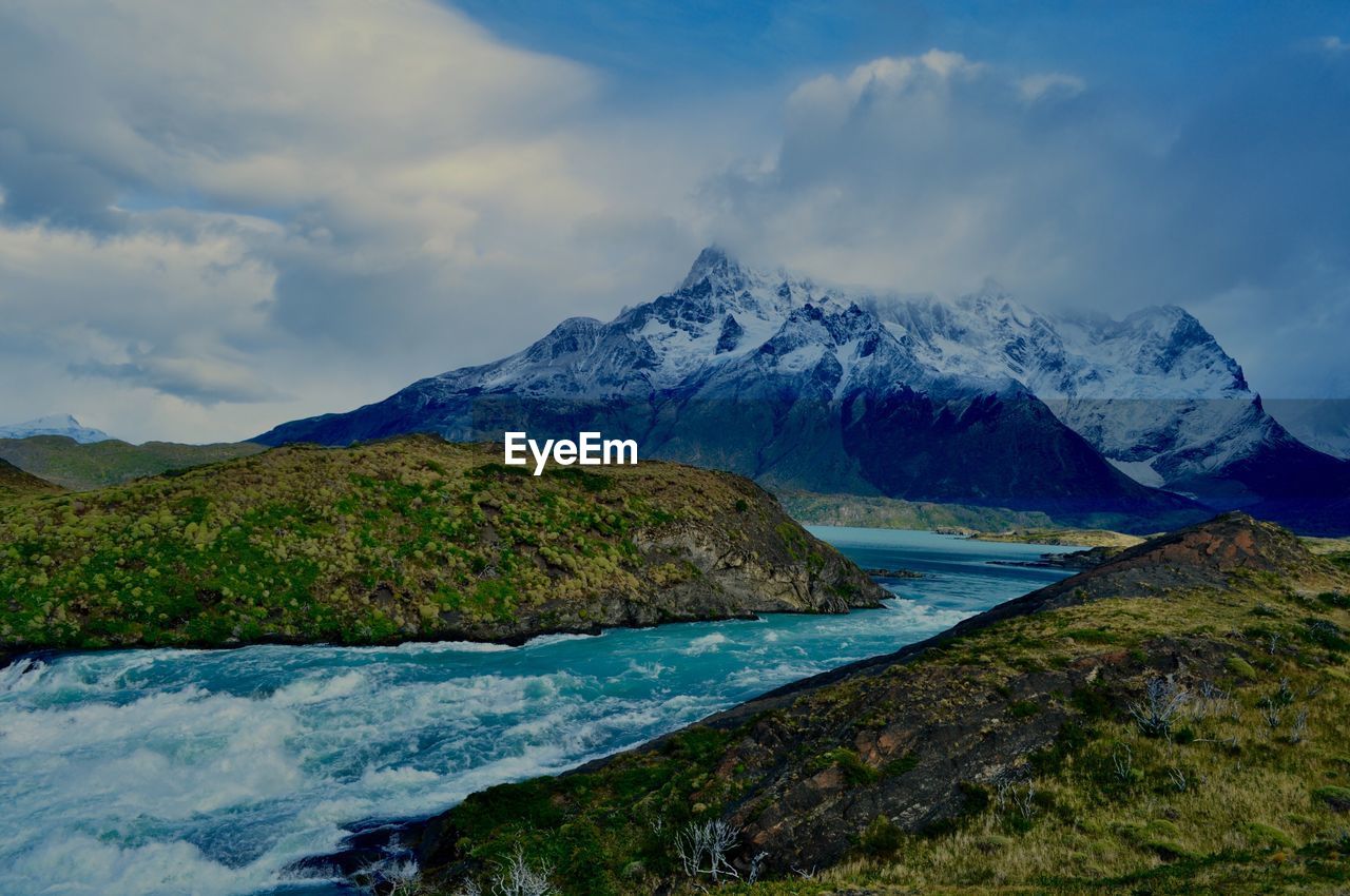 Scenic view of snowcapped mountains against sky