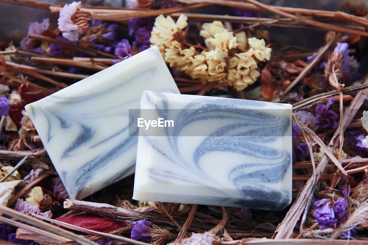 High angle view of soaps on flowers