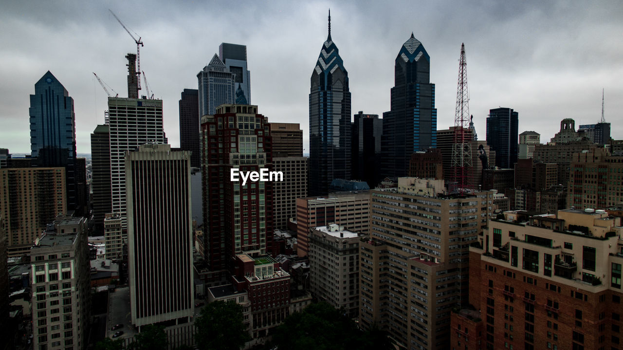 Modern buildings in city against sky