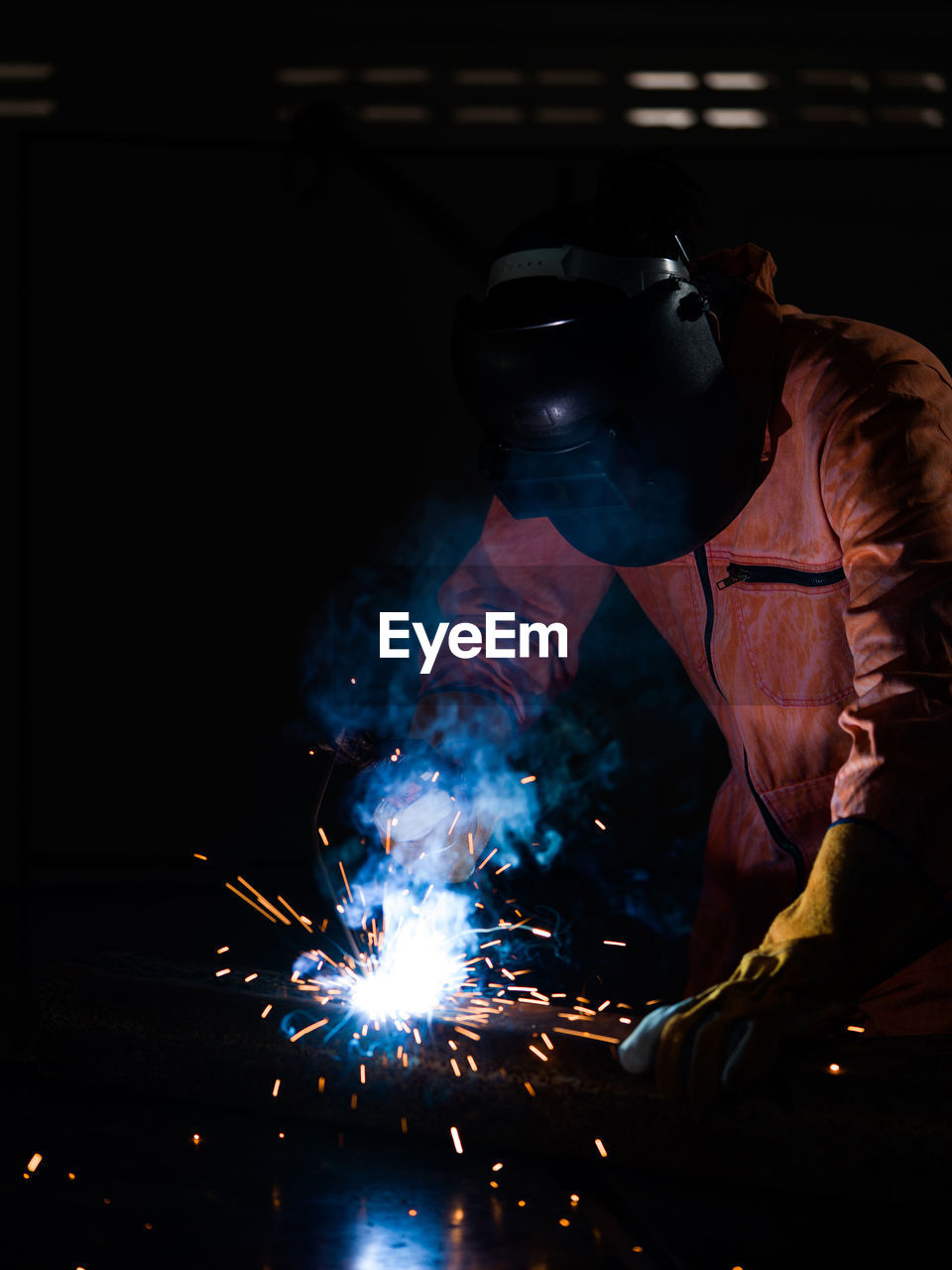 Welder working in industry