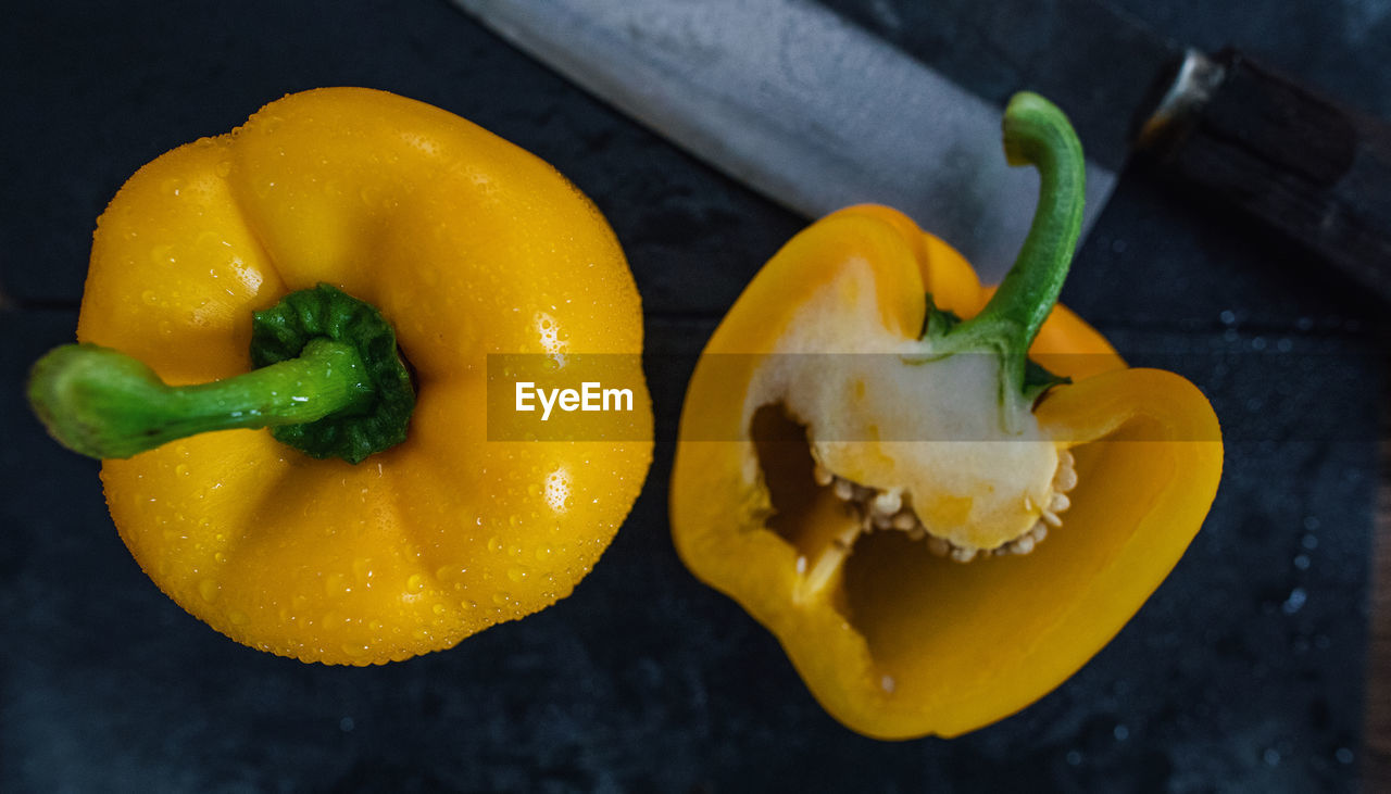 High angle view of yellow bell peppers on table