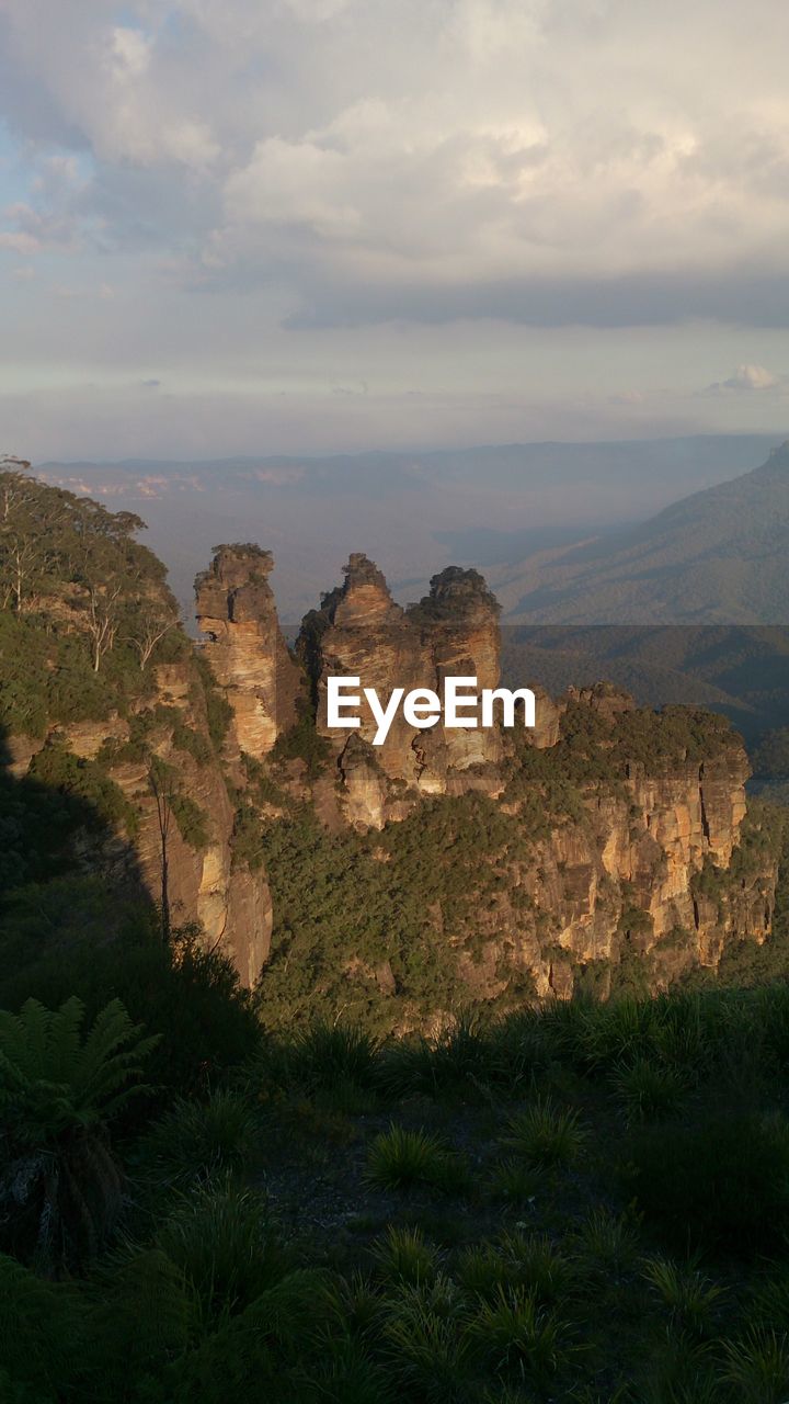 SCENIC VIEW OF MOUNTAIN AGAINST SKY