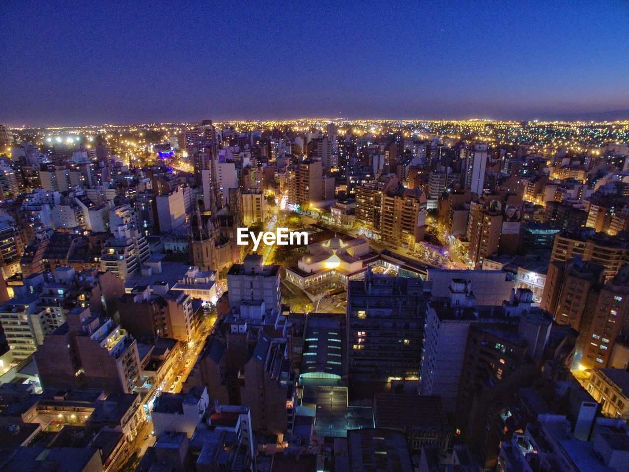 Illuminated cityscape at night