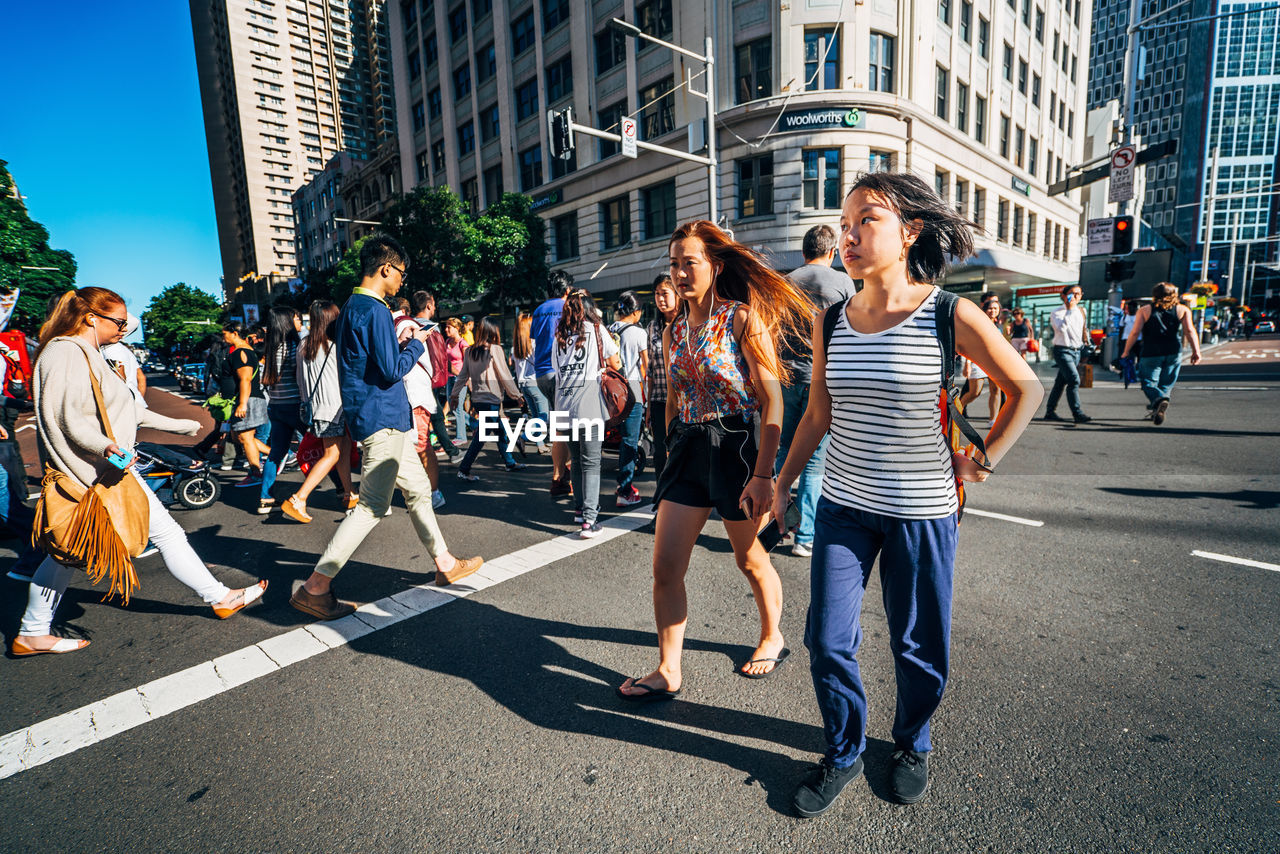 PEOPLE WALKING ON STREET