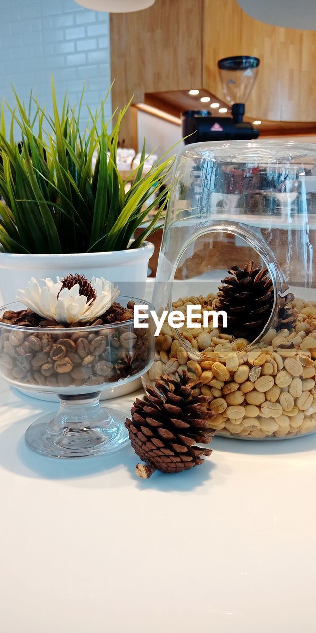 CLOSE-UP OF ICE CREAM ON TABLE