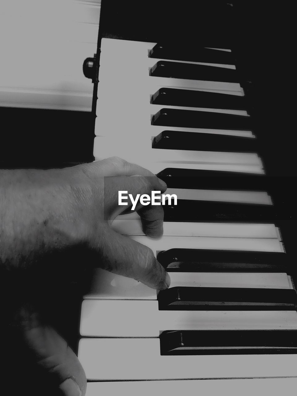 MAN PLAYING PIANO