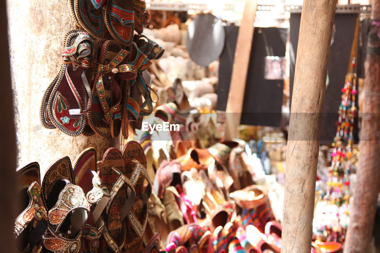 Close-up of footwear for sale at market