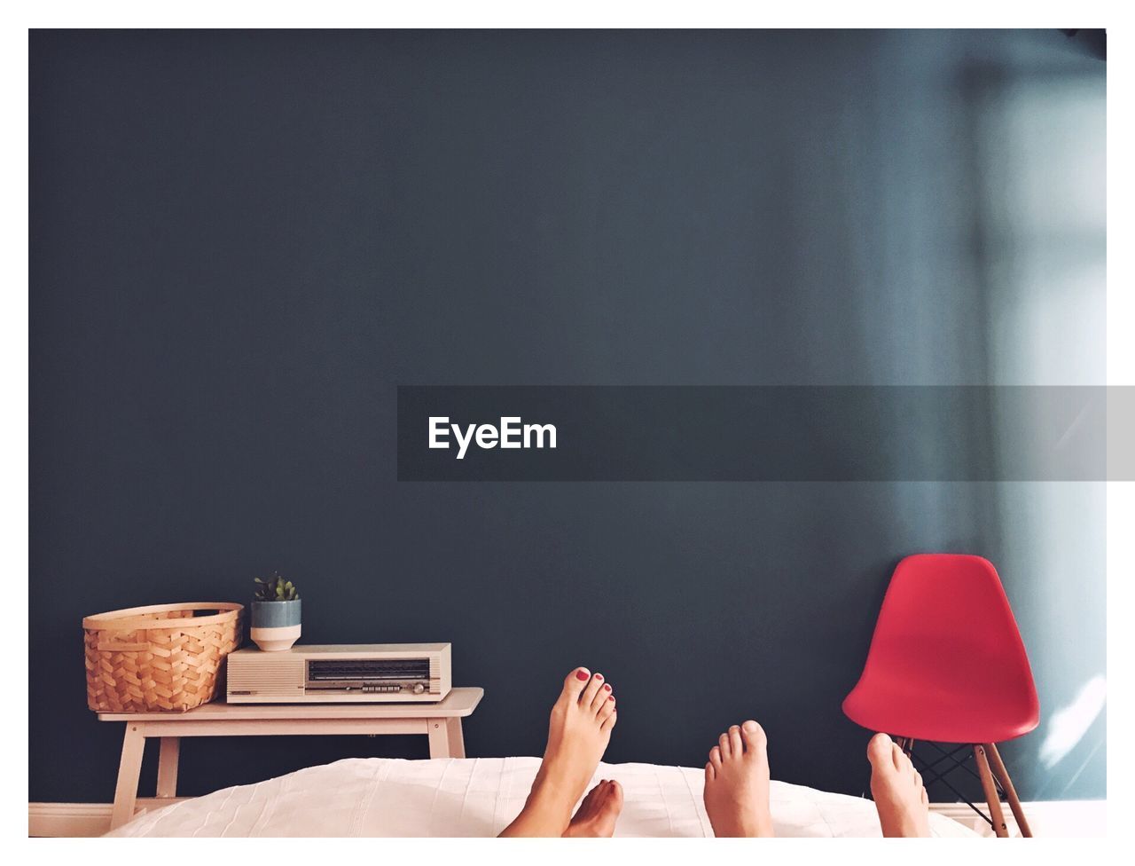 Low section of couple in bed