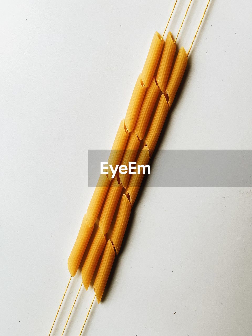 High angle view of pasta on white background