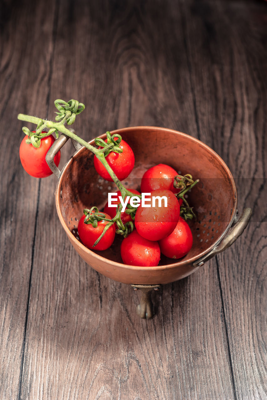 High angle view of tomatoes in bowl on table