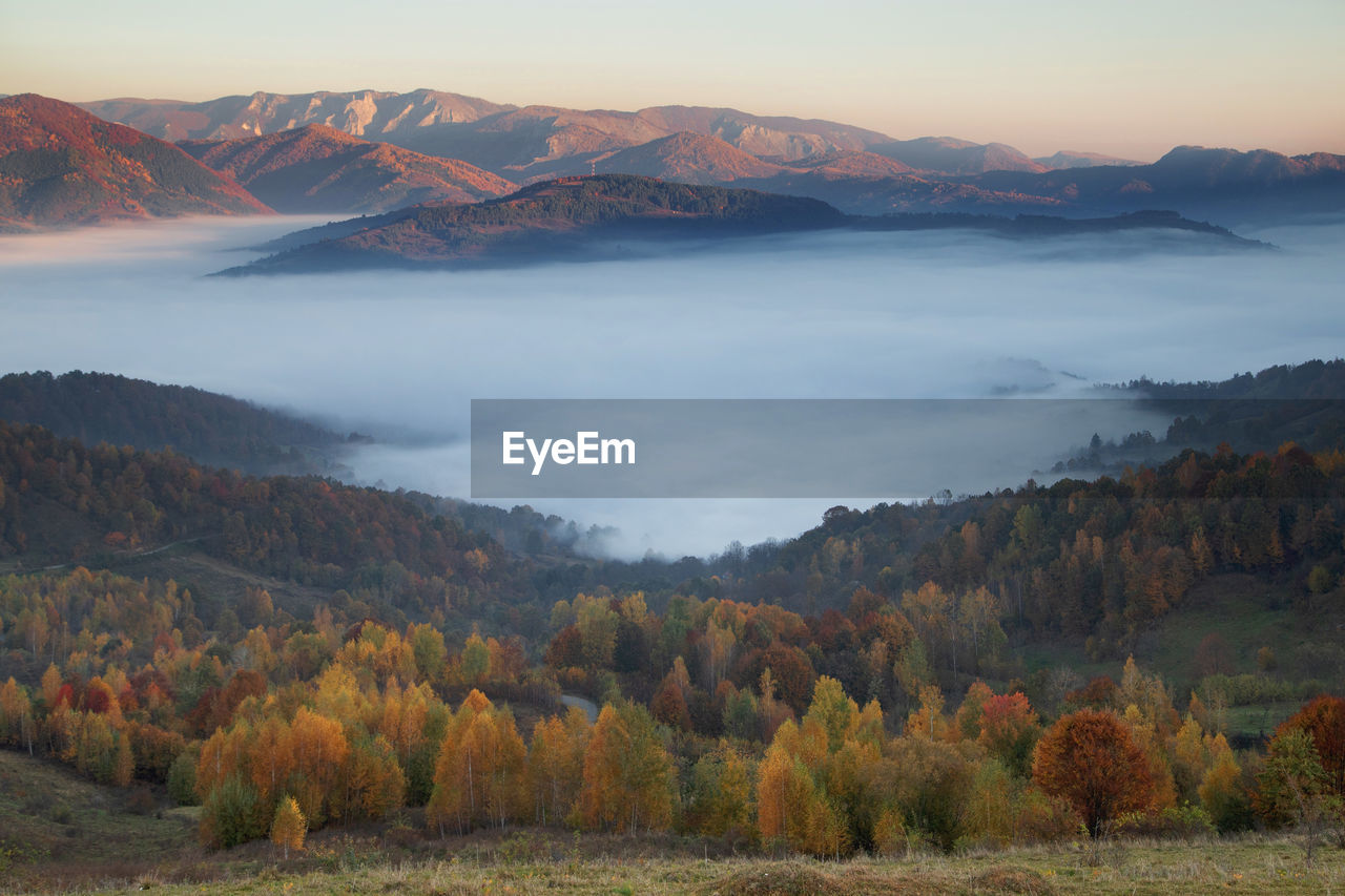 Scenic view of mountains against sky during autumn