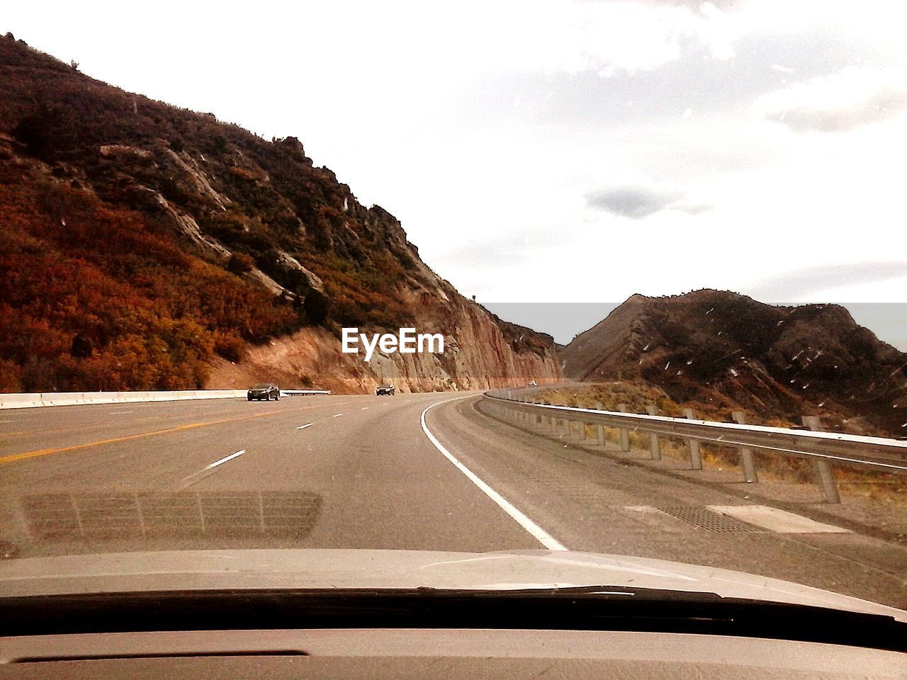 EMPTY COUNTRY ROAD ALONG LANDSCAPE