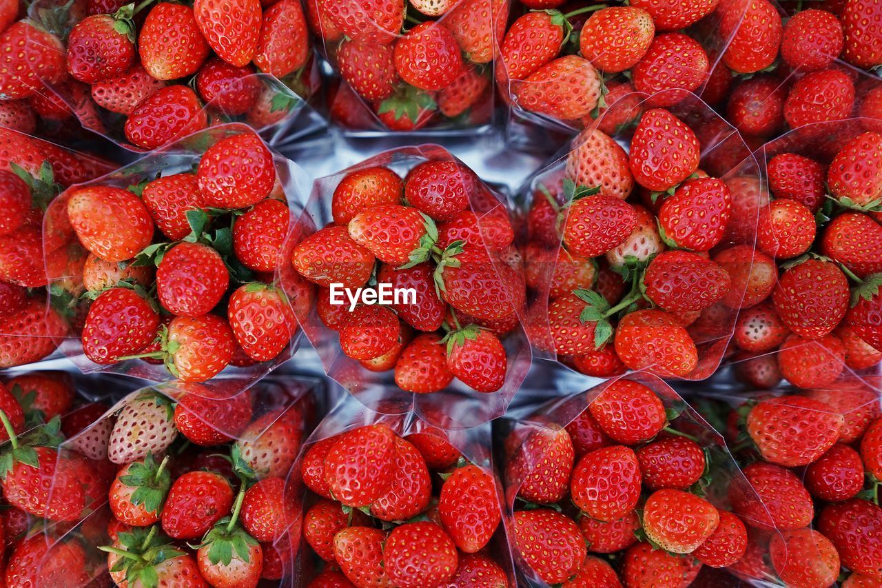 Strawberry fruit on market, colorful fruit enrich with vitamin