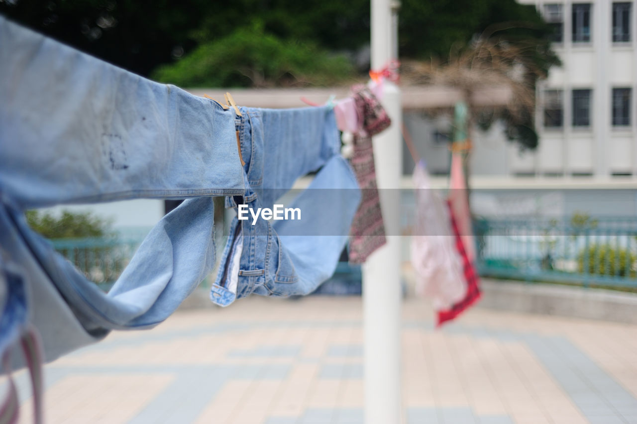 Laundries hanging on clothesline