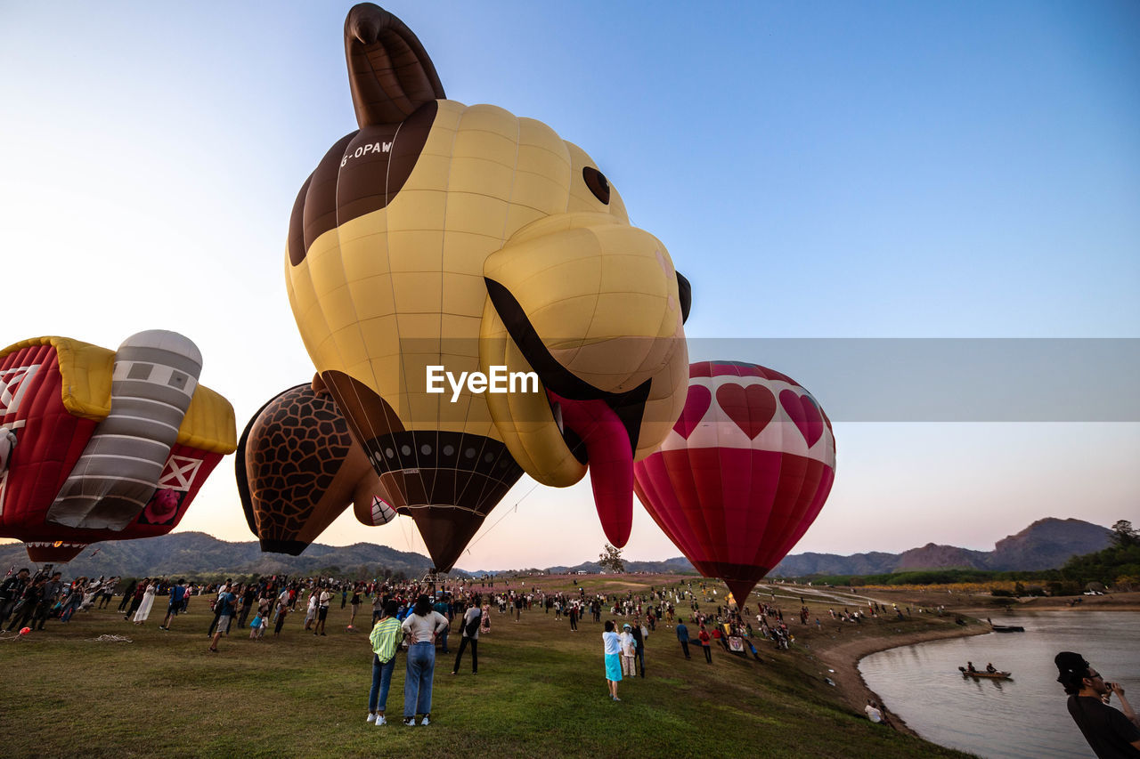 GROUP OF PEOPLE ON HOT AIR BALLOON