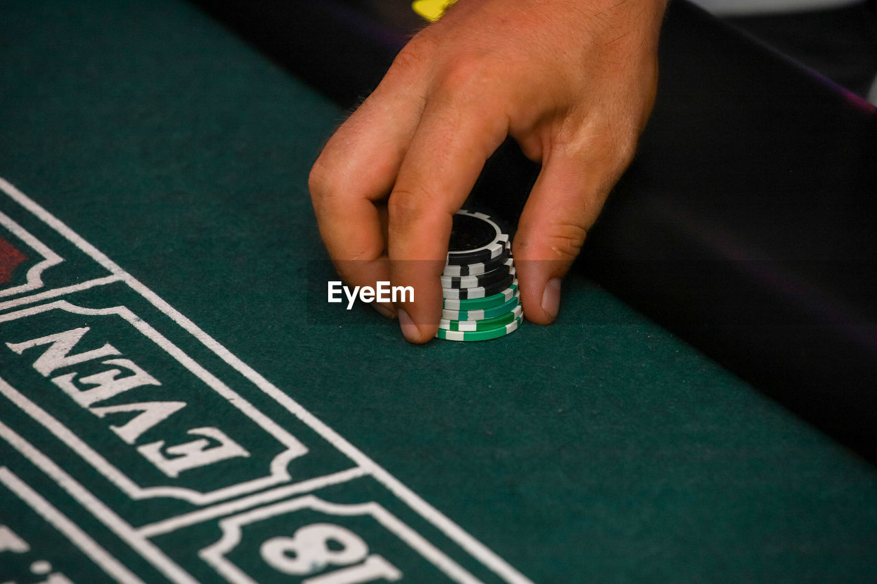 Close-up of hands on table