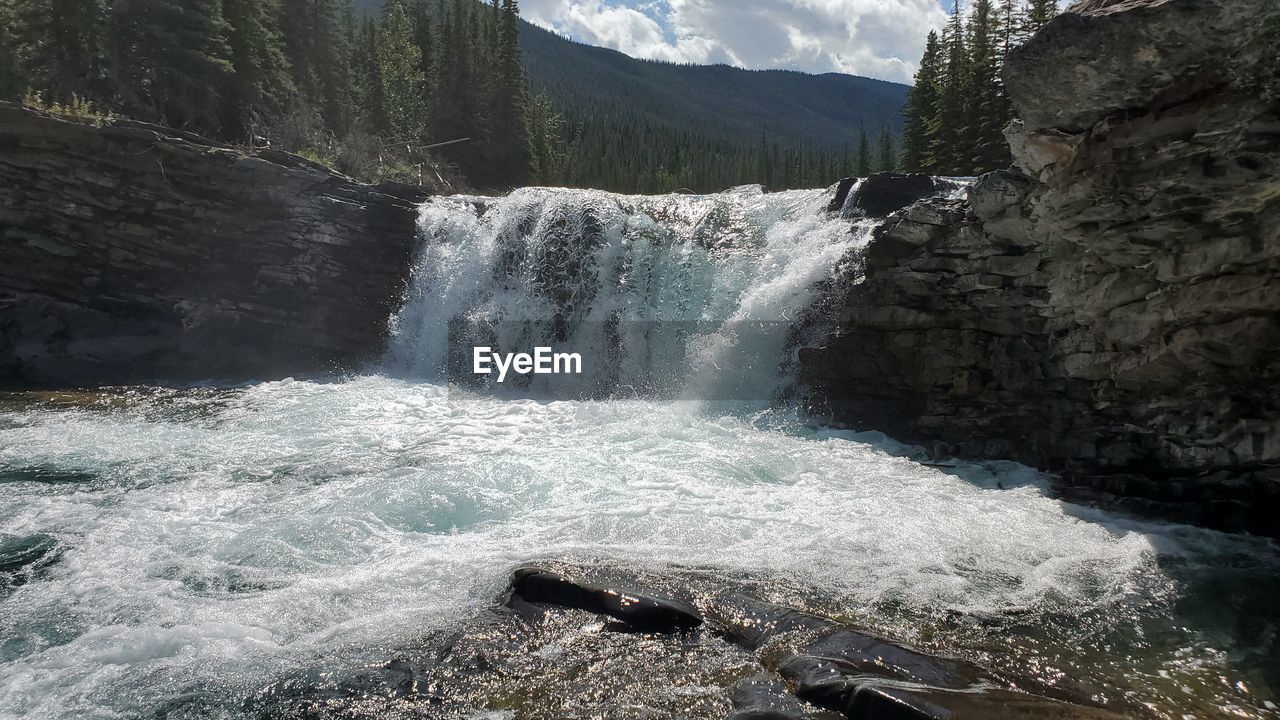 WATERFALL IN ROCKS