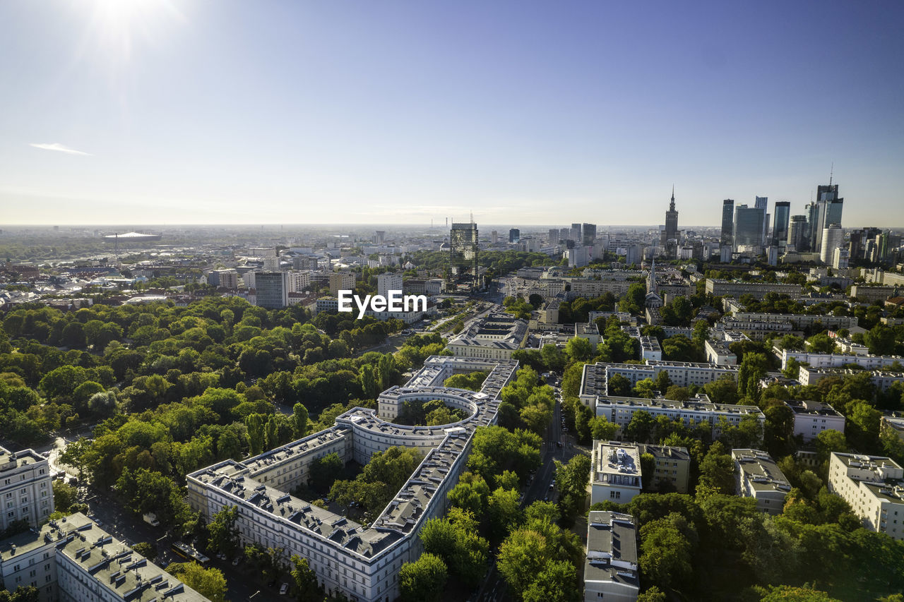 Beautiful panoramic drone view of the centre of modern warsaw with silhouettes of skyscrapers. 