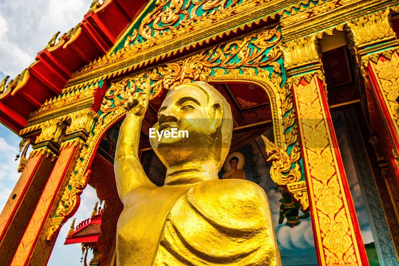 Low angle view of statue at temple