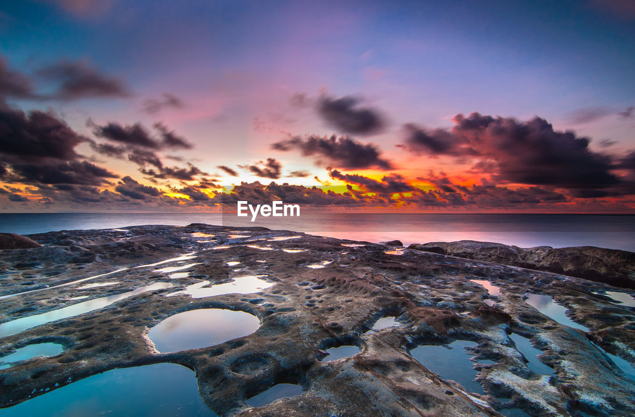 Scenic view of dramatic sky over borneo, west malaysia  during sunset