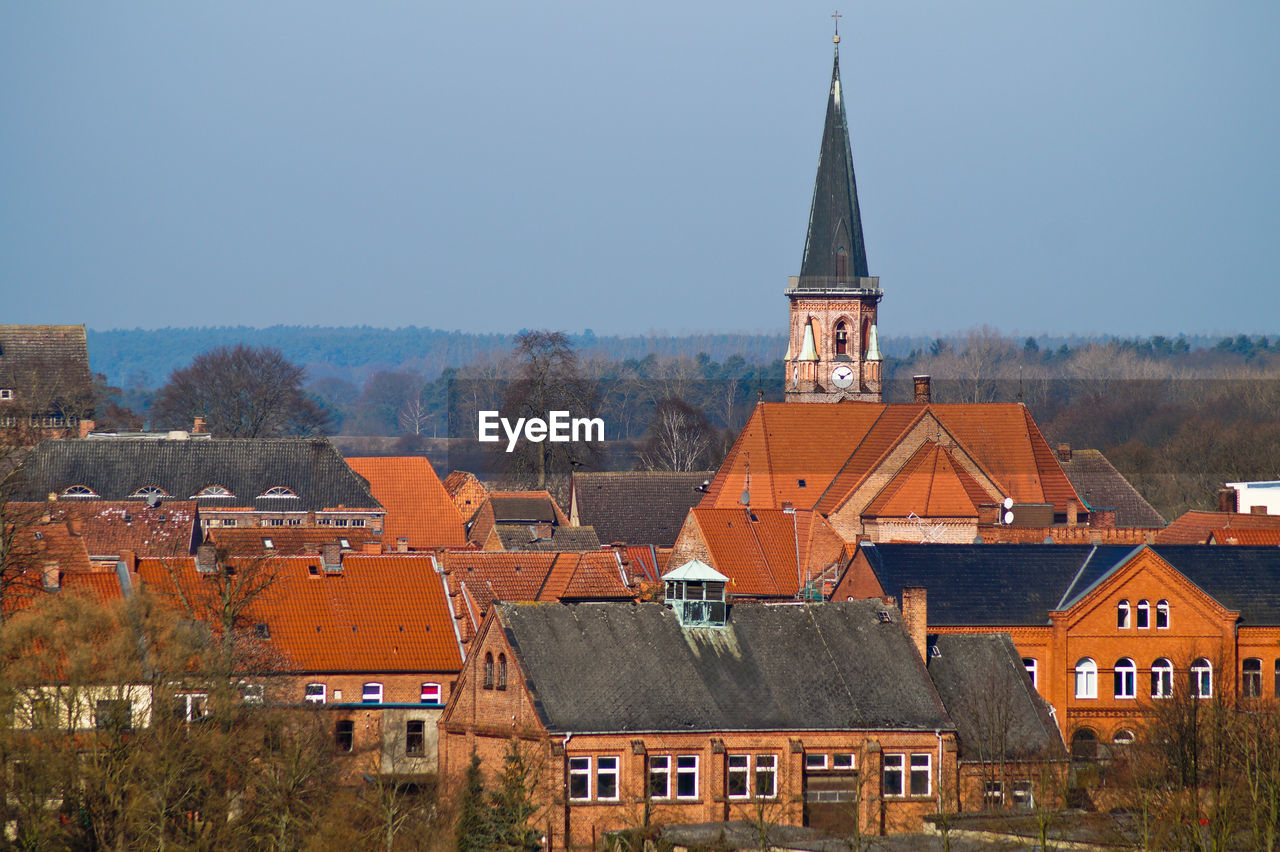 Close-up of buildings with church in background