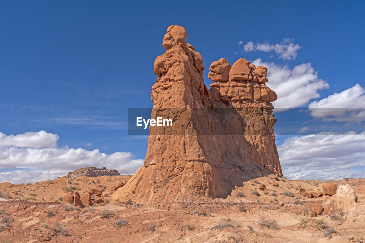 Side view of the sandstone monolith the three sisters in goblin valley state park in utah