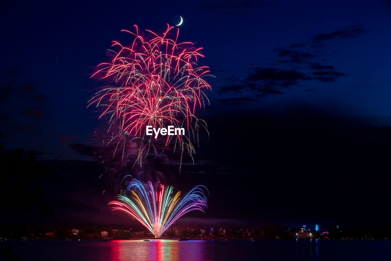 fireworks, night, firework display, event, celebration, illuminated, exploding, arts culture and entertainment, motion, water, new year's eve, sky, nature, recreation, firework - man made object, multi colored, no people, reflection, long exposure, architecture, outdoors, city, travel destinations, beauty in nature