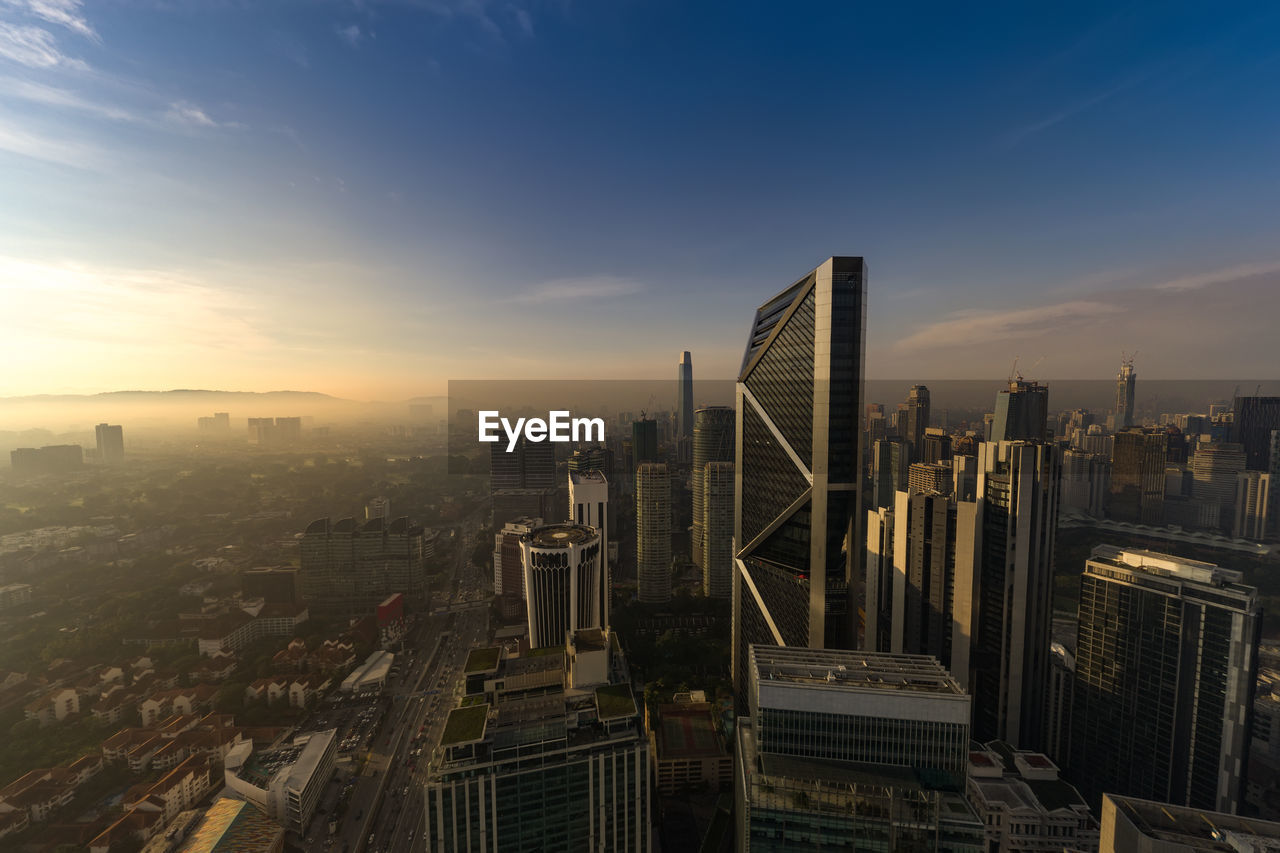 PANORAMIC SHOT OF BUILDINGS AGAINST SKY